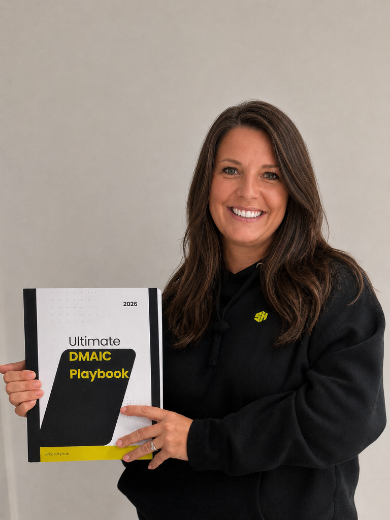 Sam holding the Ultimate DMAIC Playbook